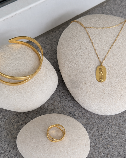 CRISS CROSS RING WITH INNER BAND LOGO